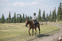 Helen Riding Next To Road