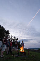 Standing Around Camp Fire