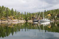 Kayaking Up To Sailboats