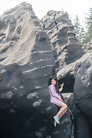 Claira Sitting On Rock