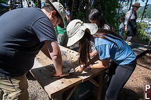 Nara Putting Outrigger On Boat