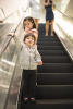 Claira Riding The Escalator