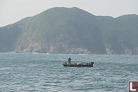 Fisherman Pulling Up Net