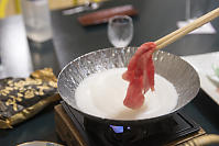 Dipping Beef Into Milk