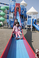 Claira Leads The Slide Train