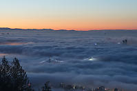 Bridge Sticking Through Clouds