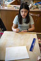 Claira Drawing Bird Box Side