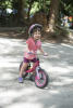 Claira Grinning On Her Bike