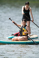 Claira Sitting On Paddleboard