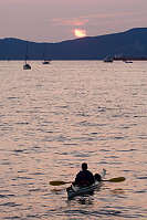 Kayaker At Sunset