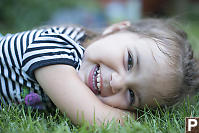 Lexi Lying Down In The Grass