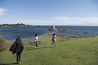 Field Overlooking Lighthouse