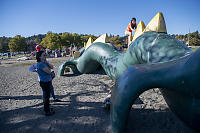 Claira Climbing Cadborosaurus Back