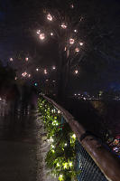 Lit Ornaments In Trees