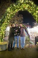 Standing Under Lit Arch