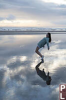 Reflection On Wet Sand