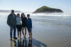 Grandparents And Grandkids On Beach