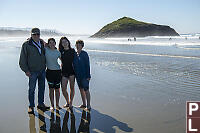 Grandparents And Grandkids On Beach