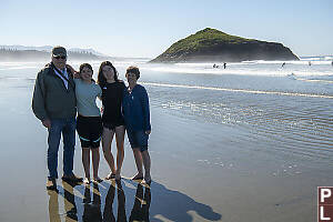 Grandparents And Grandkids On Beach