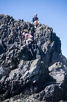 Kids Climbing On Rock