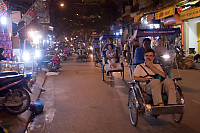 Tourists Going By In Cyclos
